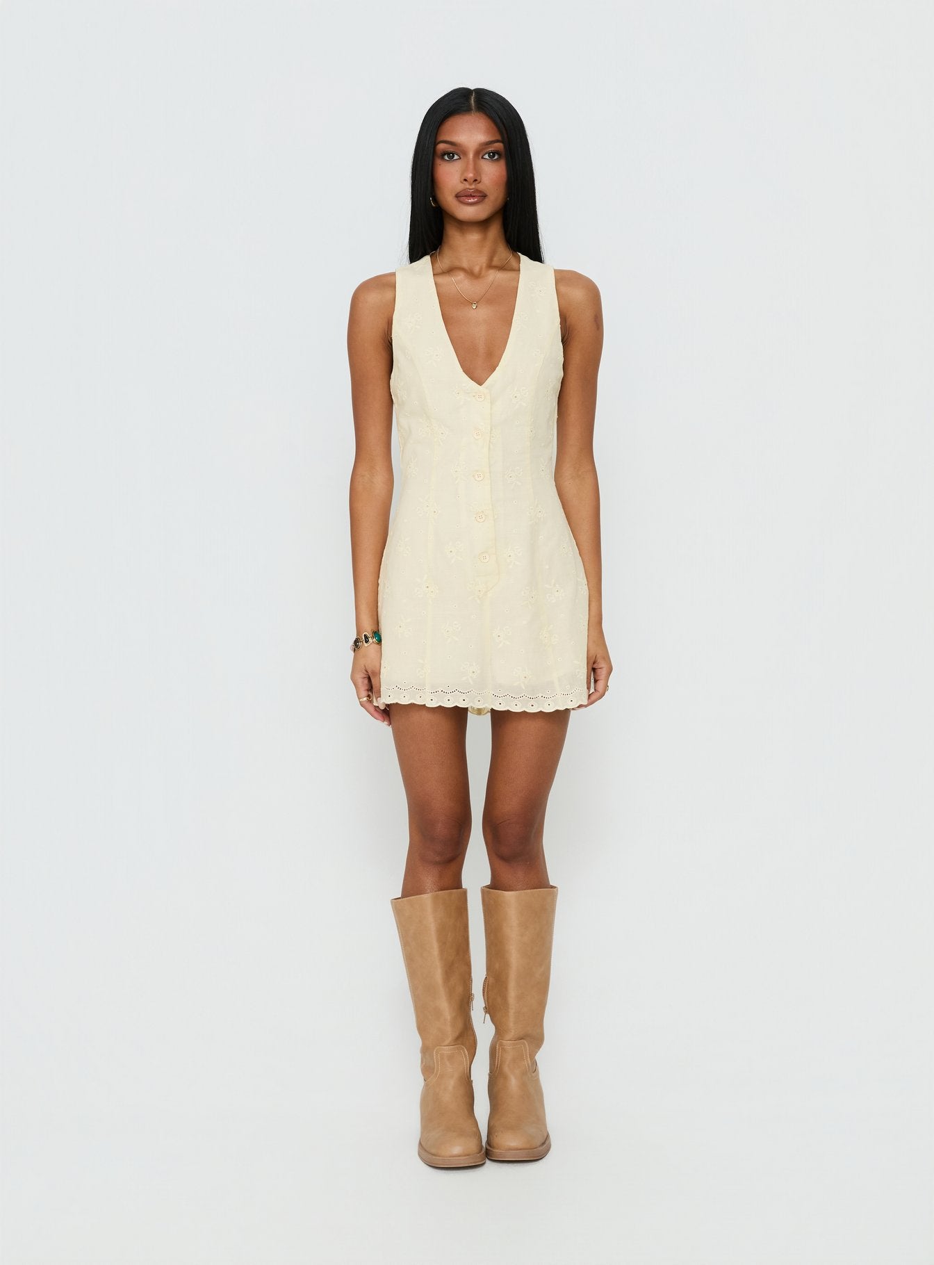 Sylvara Textured Button Up Romper Yellow